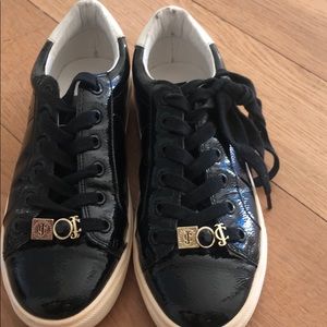 Patent leather black and white woman’s sneakers